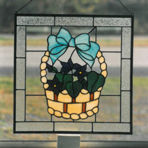 Stained Glass Basket with blue ribbon and purple Flowers