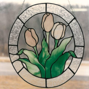 Stained Glass Suncatcher Showing 3 light pink Tulips